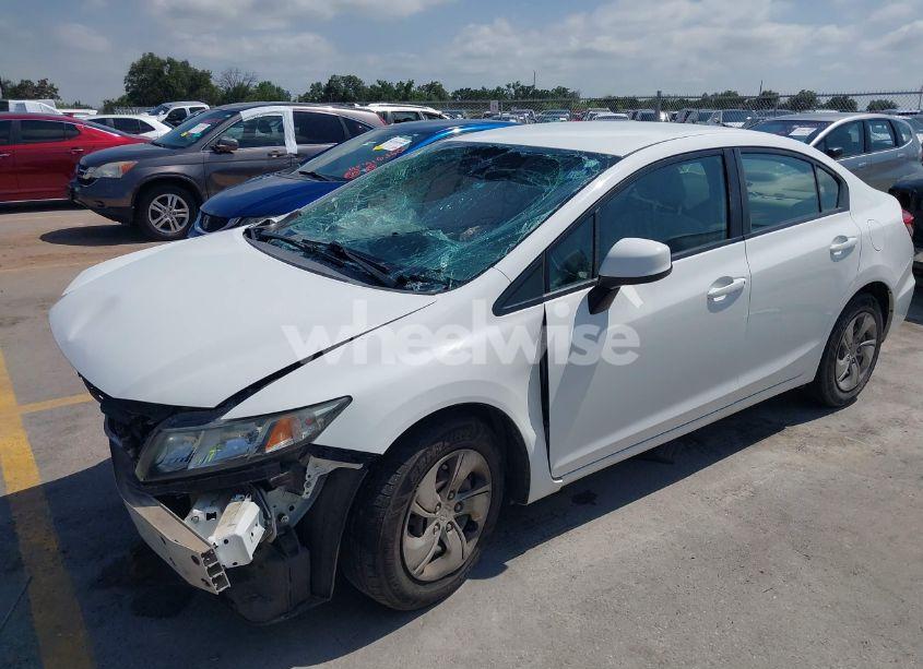 Photo 2 of 2013 Honda Civic LX (VIN 2HGFB2F58DH590843)