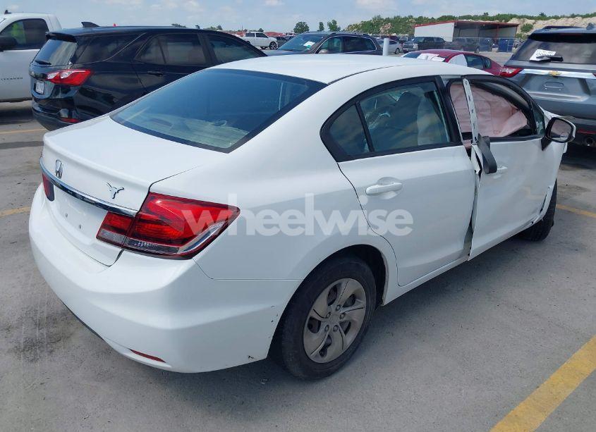 Photo 4 of 2013 Honda Civic LX (VIN 2HGFB2F58DH590843)