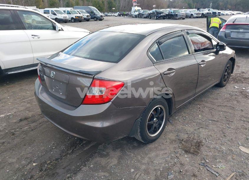 Photo 4 of 2012 Honda Civic LX (VIN 2HGFB2F5XCH518928)