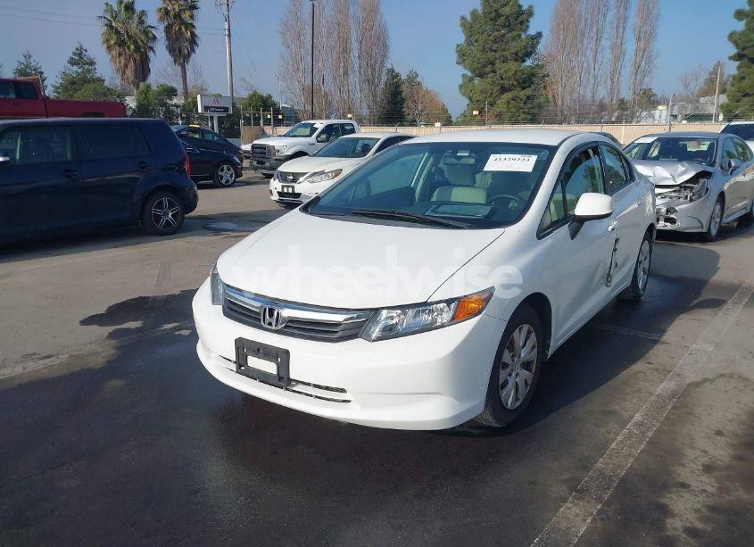 Photo 2 of 2012 Honda Civic SDN LX (VIN 2HGFB2F5XCH570513)