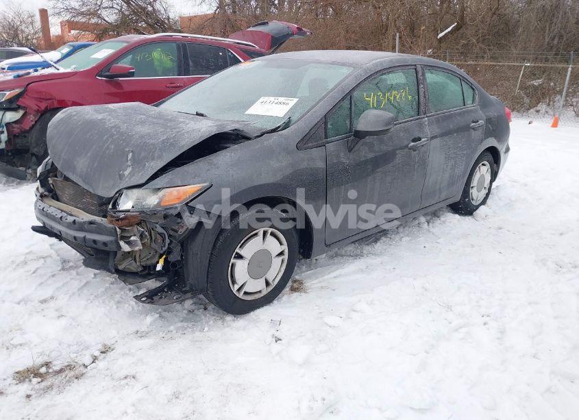 Photo 2 of 2012 Honda Civic SDN HF (VIN 2HGFB2F65CH322520)