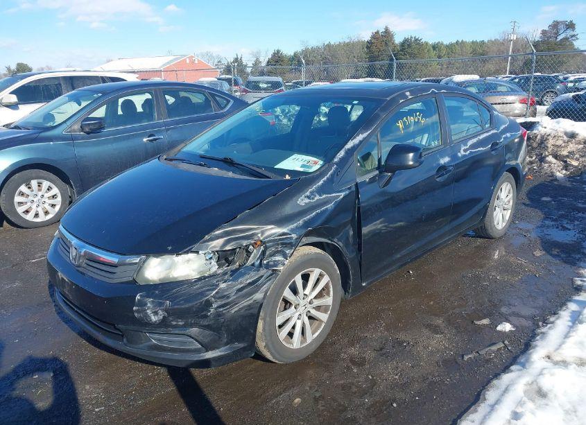 Photo 2 of 2012 Honda Civic SDN (VIN 2HGFB2F93CH545858)