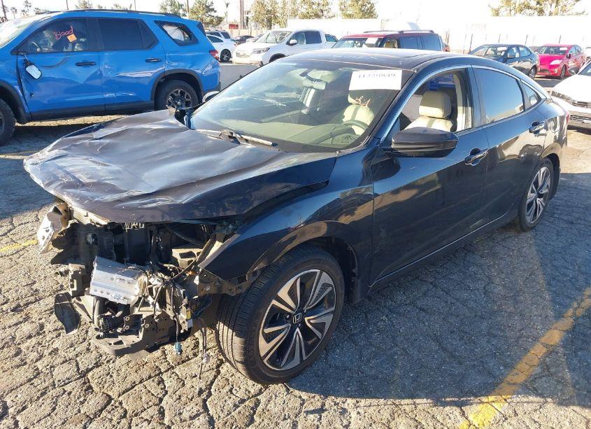 Photo 2 of 2017 Honda Civic EX-T (VIN 2HGFC1F30HH631090)