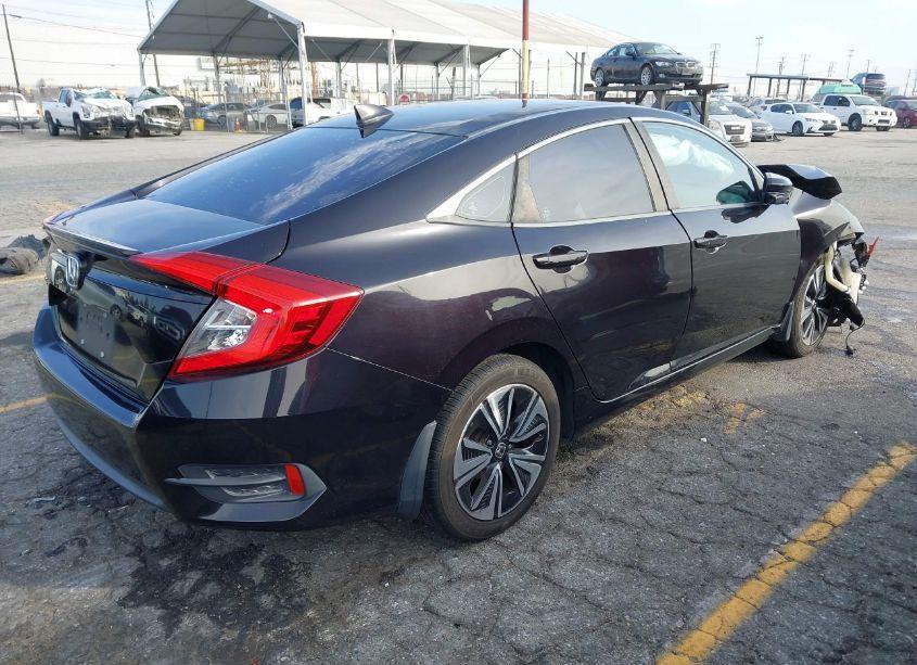 Photo 4 of 2017 Honda Civic EX-T (VIN 2HGFC1F30HH631090)
