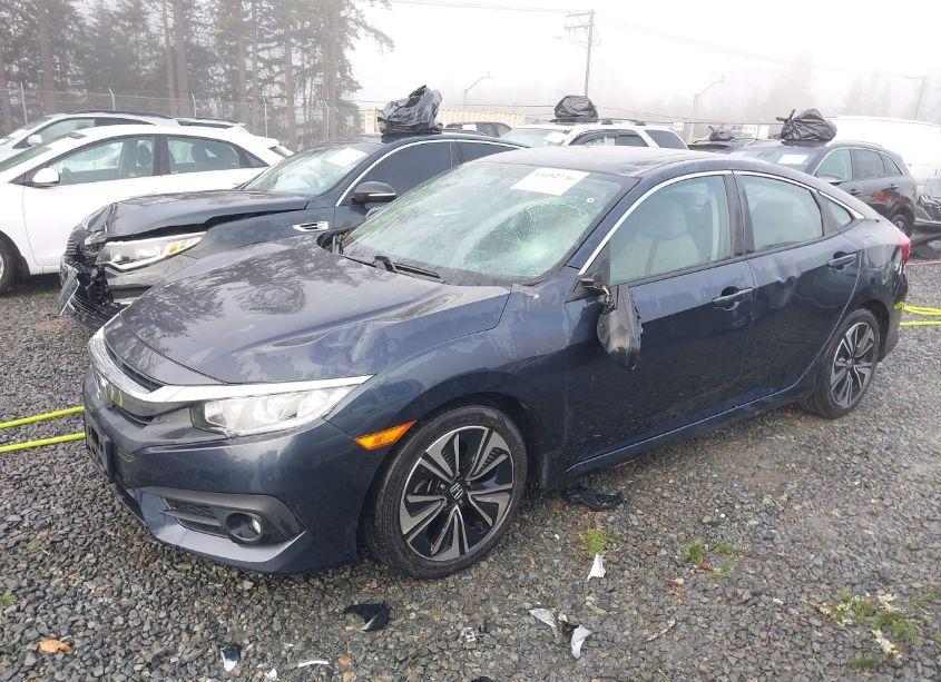 Photo 2 of 2017 Honda Civic EX-T (VIN 2HGFC1F37HH658951)