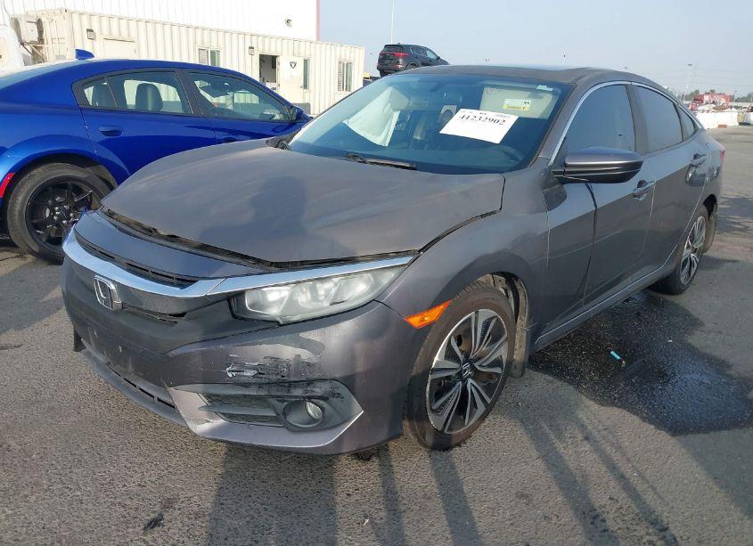 Photo 2 of 2017 Honda Civic EX-T (VIN 2HGFC1F39HH632352)