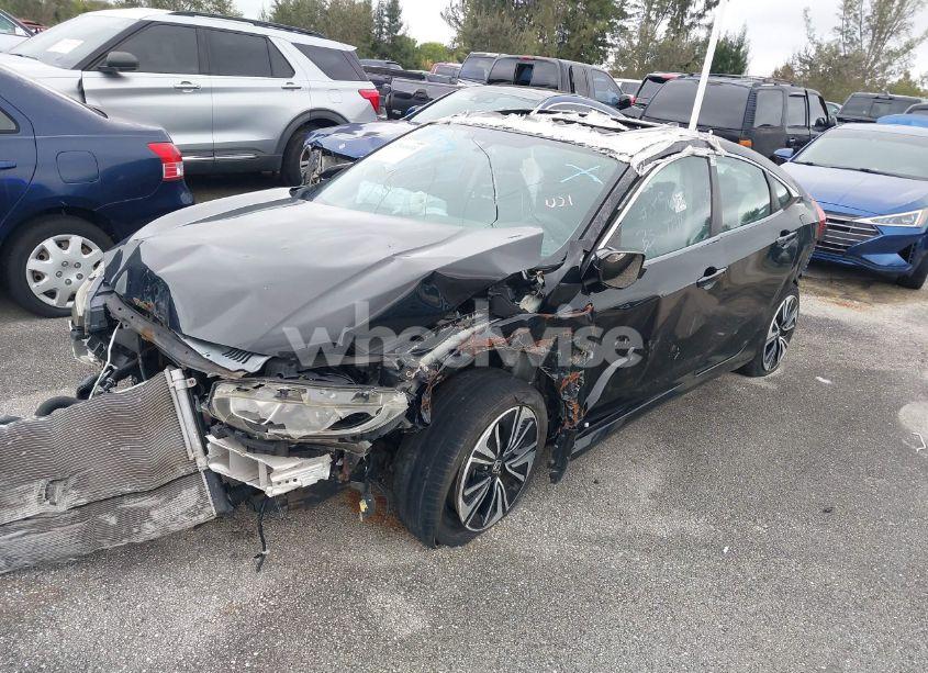 Photo 2 of 2017 Honda Civic EX-T (VIN 2HGFC1F39HH638510)