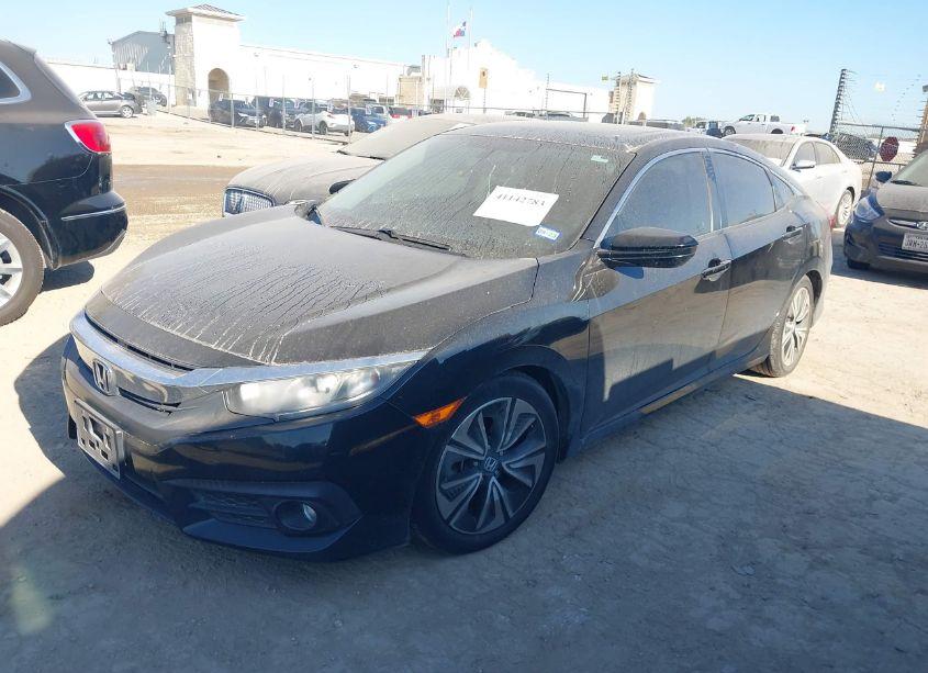 Photo 2 of 2017 Honda Civic EX-T (VIN 2HGFC1F3XHH650567)