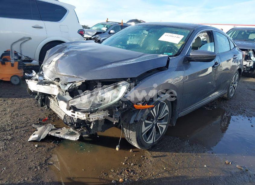 Photo 2 of 2017 Honda Civic EX-L (VIN 2HGFC1F70HH631268)