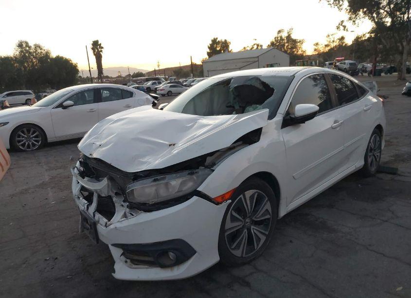 Photo 2 of 2017 Honda Civic EX-L (VIN 2HGFC1F70HH642982)