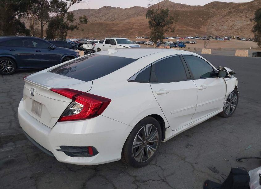 Photo 4 of 2017 Honda Civic EX-L (VIN 2HGFC1F70HH642982)