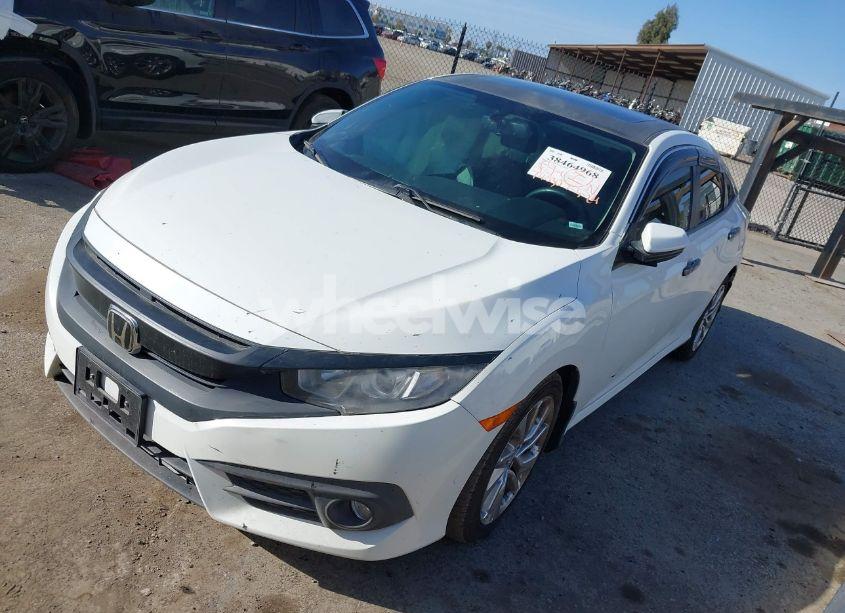 Photo 2 of 2017 Honda Civic EX-L (VIN 2HGFC1F71HH636172)