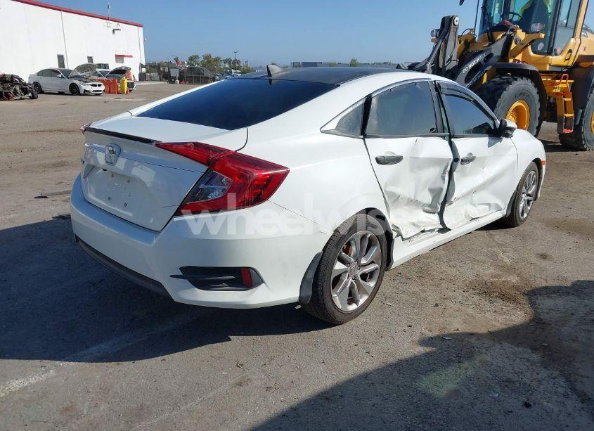 Photo 4 of 2017 Honda Civic EX-L (VIN 2HGFC1F71HH636172)