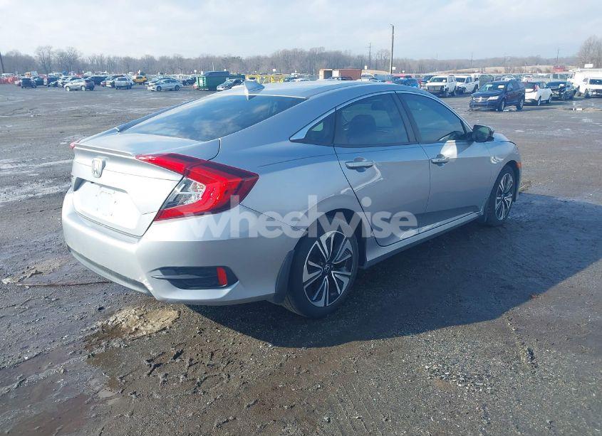 Photo 4 of 2018 Honda Civic EX-L (VIN 2HGFC1F71JH642625)