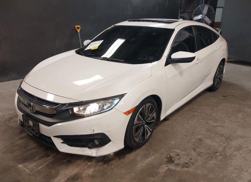 Photo 2 of 2018 Honda Civic EX-L (VIN 2HGFC1F71JH645363)