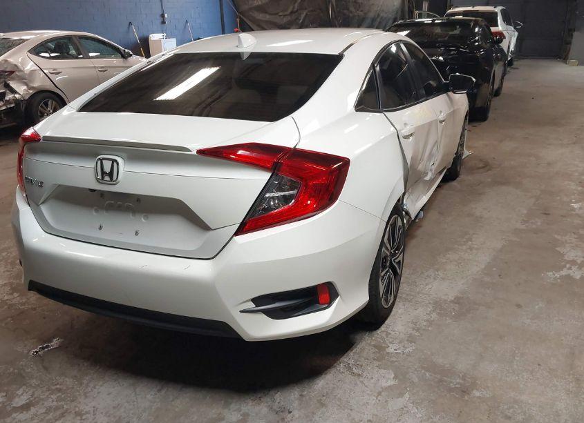 Photo 4 of 2018 Honda Civic EX-L (VIN 2HGFC1F71JH645363)