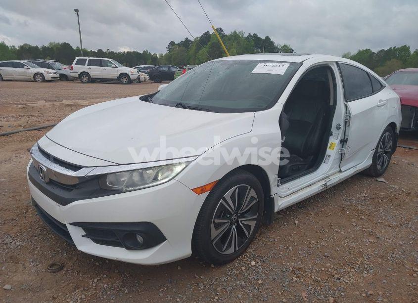 Photo 2 of 2017 Honda Civic EX-L (VIN 2HGFC1F72HH658763)