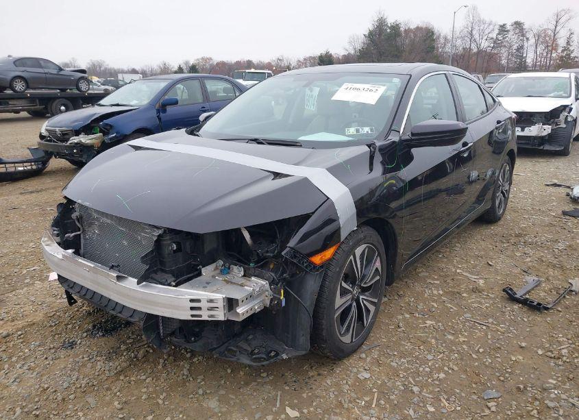 Photo 2 of 2018 Honda Civic EX-L (VIN 2HGFC1F72JH644982)