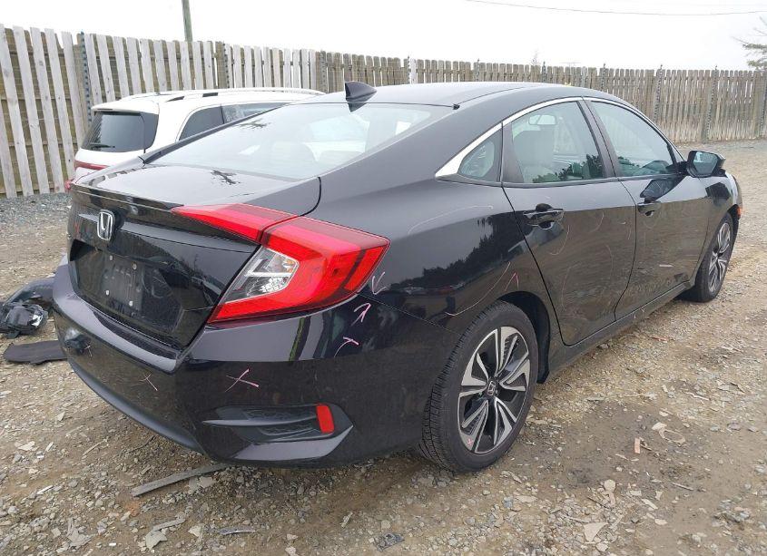 Photo 4 of 2018 Honda Civic EX-L (VIN 2HGFC1F72JH644982)