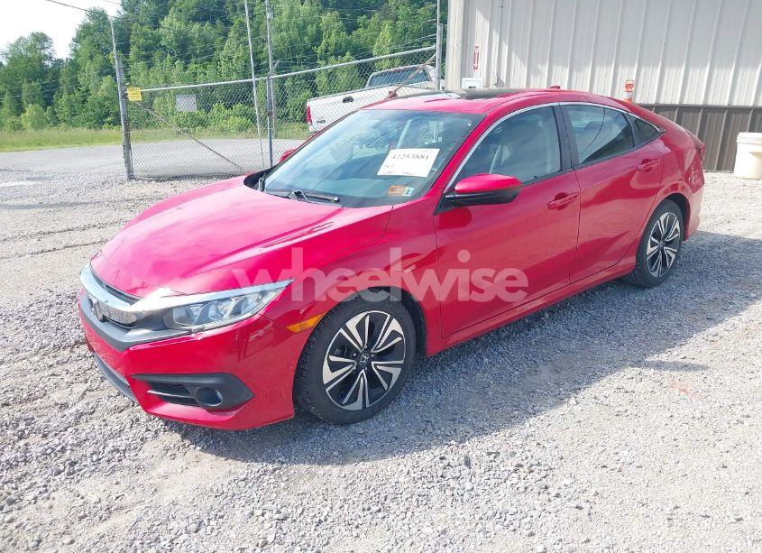 Photo 2 of 2016 Honda Civic EX-L (VIN 2HGFC1F74GH652090)