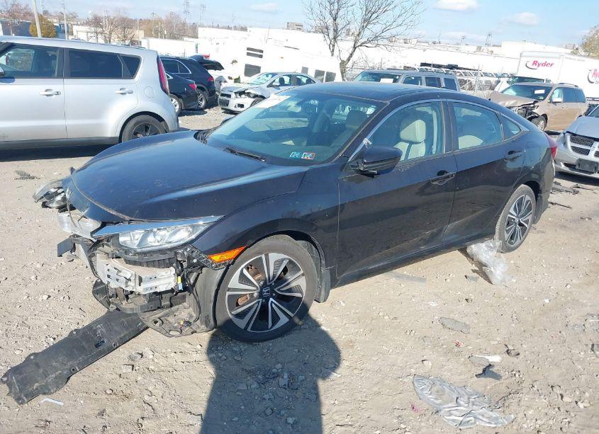 Photo 2 of 2017 Honda Civic EX-L (VIN 2HGFC1F74HH632777)