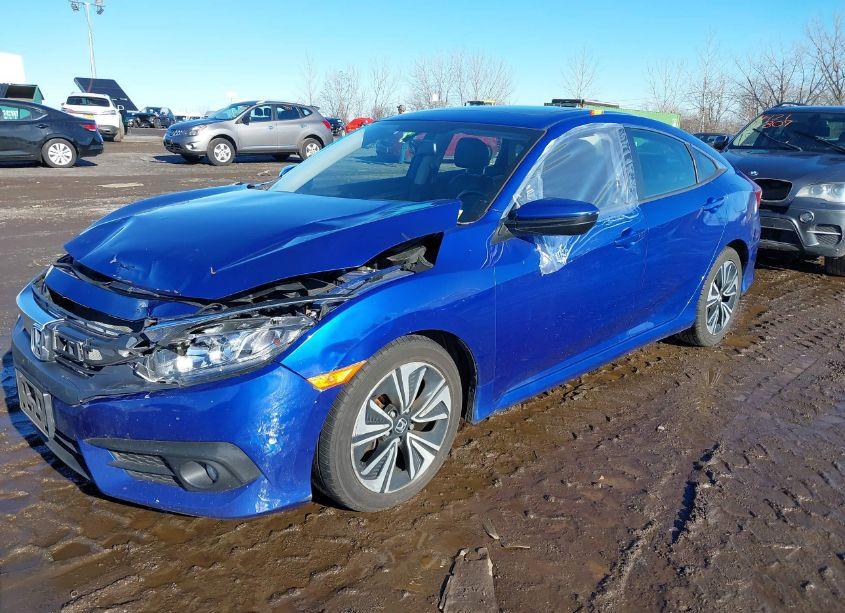 Photo 2 of 2017 Honda Civic EX-L (VIN 2HGFC1F74HH641964)