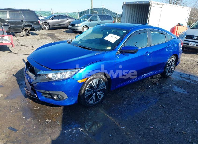 Photo 2 of 2017 Honda Civic EX-L (VIN 2HGFC1F74HH653712)