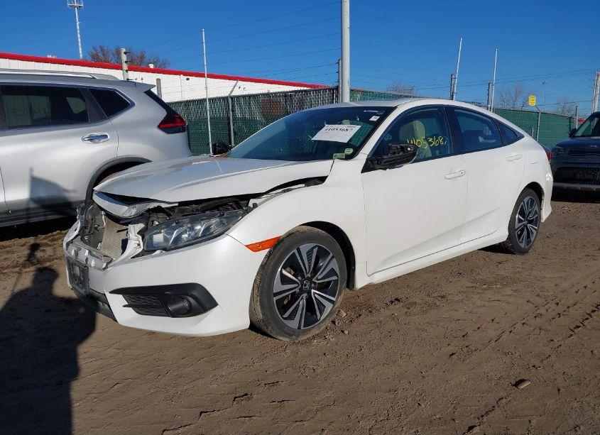 Photo 2 of 2018 Honda Civic EX-L (VIN 2HGFC1F74JH646104)