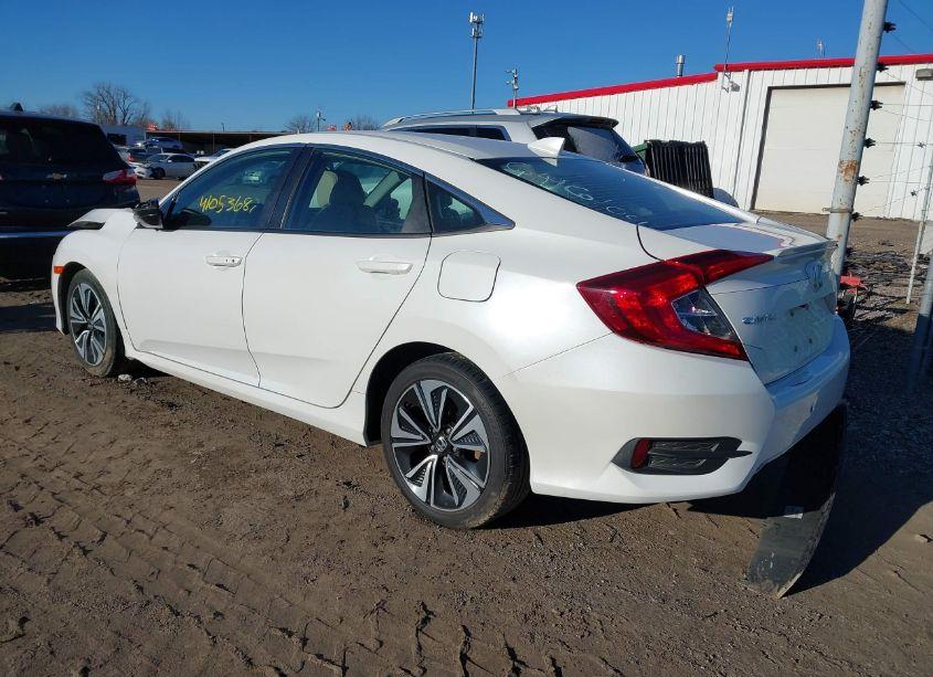 Photo 3 of 2018 Honda Civic EX-L (VIN 2HGFC1F74JH646104)