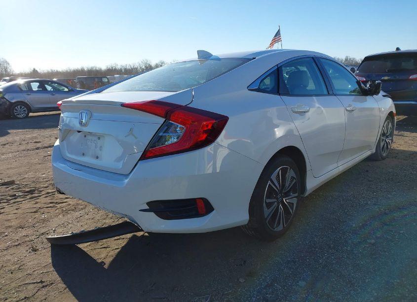 Photo 4 of 2018 Honda Civic EX-L (VIN 2HGFC1F74JH646104)