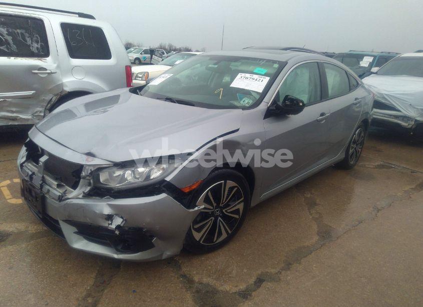 Photo 2 of 2016 Honda Civic EX-L (VIN 2HGFC1F75GH641020)