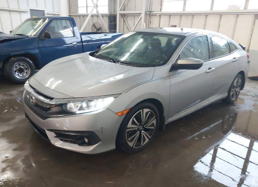 Photo 2 of 2017 Honda Civic EX-L (VIN 2HGFC1F75HH639687)