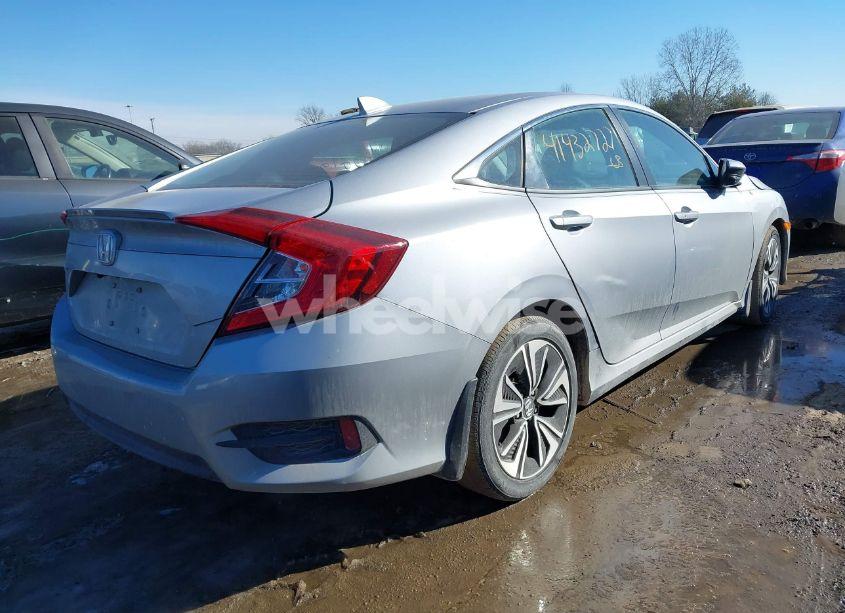 Photo 4 of 2018 Honda Civic EX-L (VIN 2HGFC1F76JH640997)