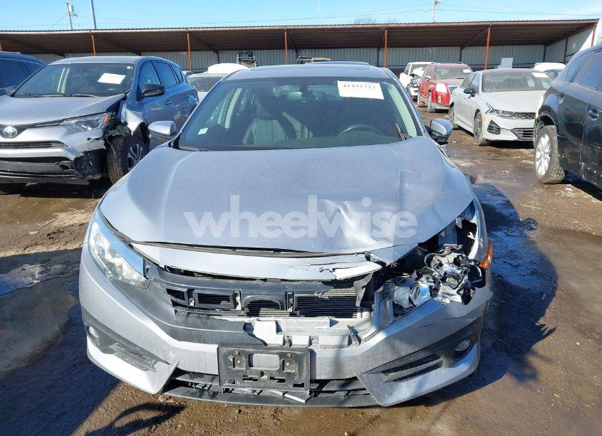 Photo 6 of 2018 Honda Civic EX-L (VIN 2HGFC1F76JH640997)