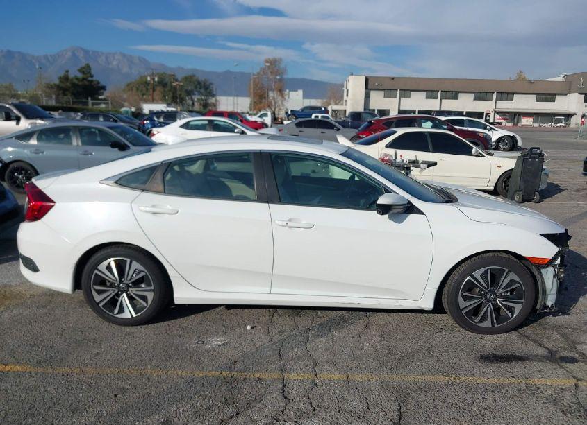 Photo 13 of 2017 Honda Civic EX-L (VIN 2HGFC1F77HH643658)