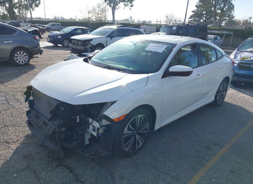 Photo 2 of 2017 Honda Civic EX-L (VIN 2HGFC1F77HH643658)