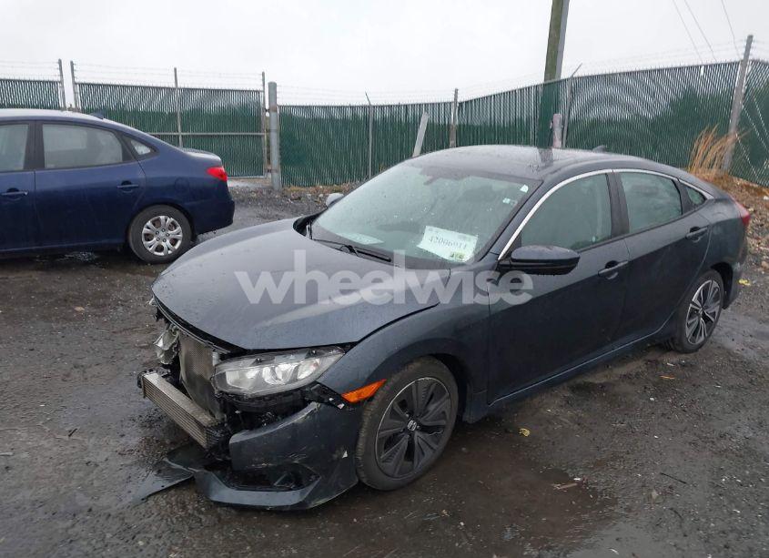 Photo 2 of 2017 Honda Civic EX-L (VIN 2HGFC1F77HH647516)