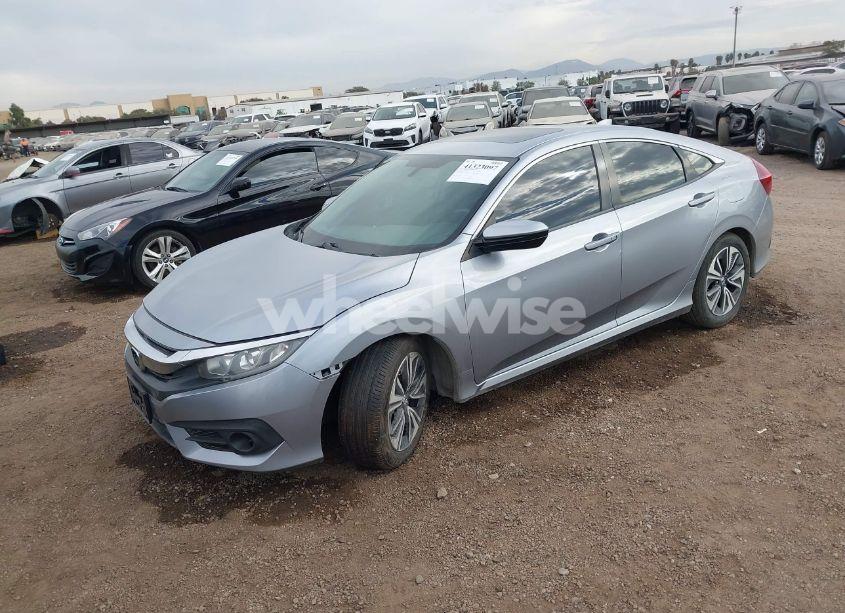 Photo 2 of 2016 Honda Civic EX-L (VIN 2HGFC1F79GH632885)