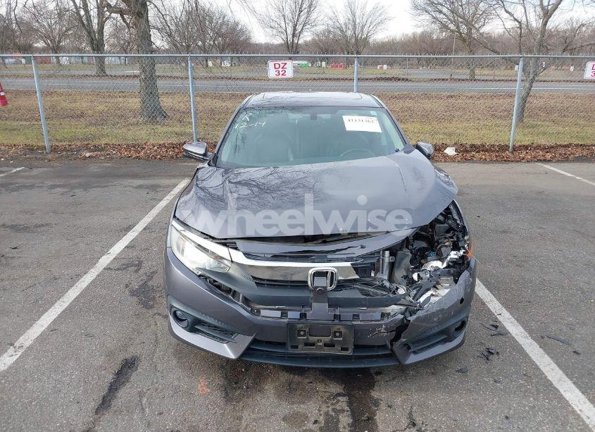 Photo 12 of 2017 Honda Civic EX-L (VIN 2HGFC1F7XHH657697)