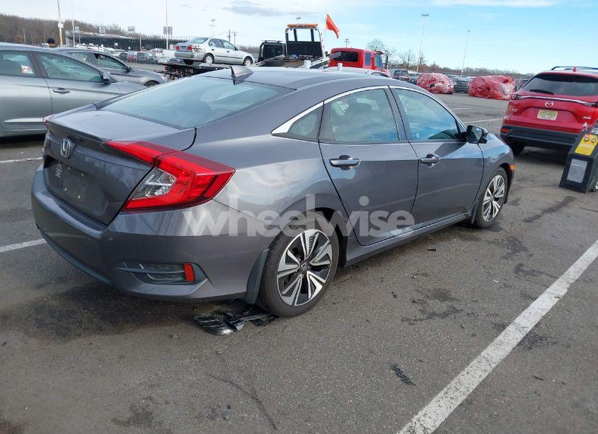 Photo 4 of 2017 Honda Civic EX-L (VIN 2HGFC1F7XHH657697)