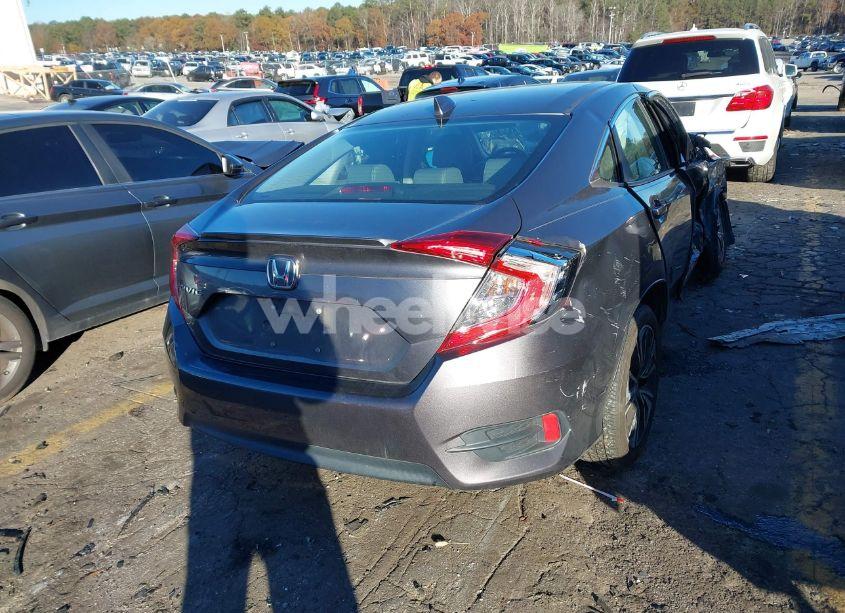 Photo 4 of 2018 Honda Civic EX-L (VIN 2HGFC1F87JH640841)