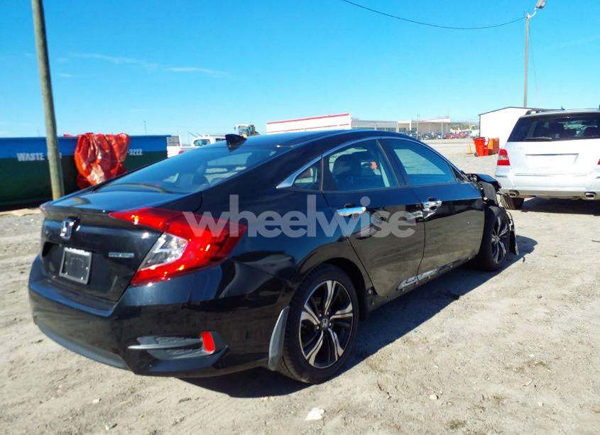 Photo 4 of 2018 Honda Civic TOURING (VIN 2HGFC1F90JH640253)