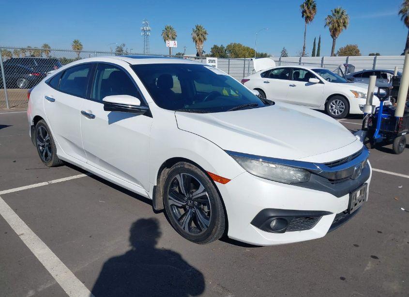 2016 Honda Civic TOURING (VIN 2HGFC1F91GH634891) main photo