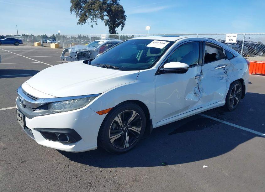 Photo 2 of 2016 Honda Civic TOURING (VIN 2HGFC1F91GH634891)