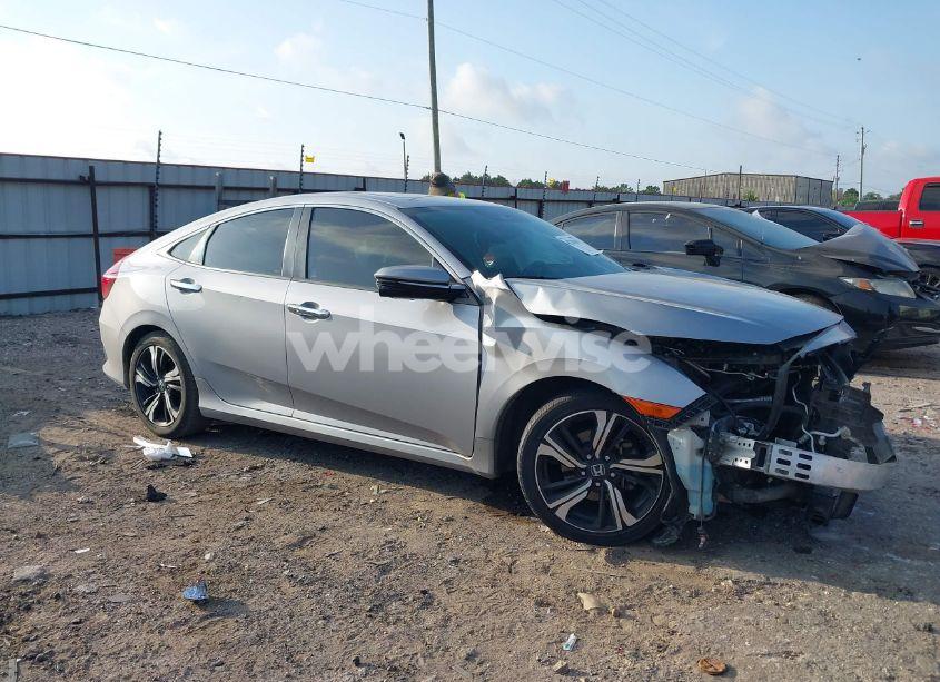 2017 Honda Civic TOURING (VIN 2HGFC1F92HH632746) main photo