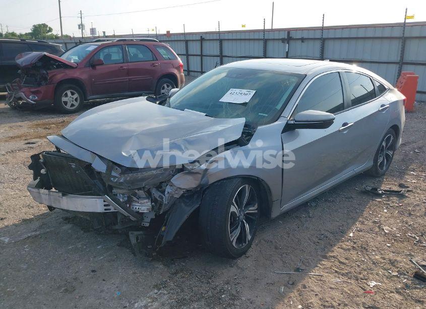 Photo 2 of 2017 Honda Civic TOURING (VIN 2HGFC1F92HH632746)