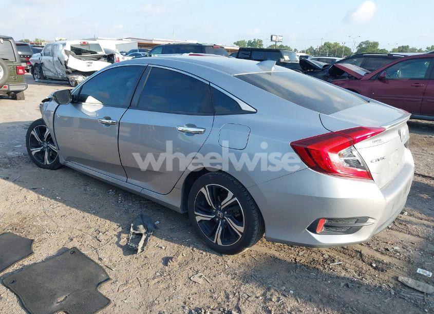 Photo 3 of 2017 Honda Civic TOURING (VIN 2HGFC1F92HH632746)