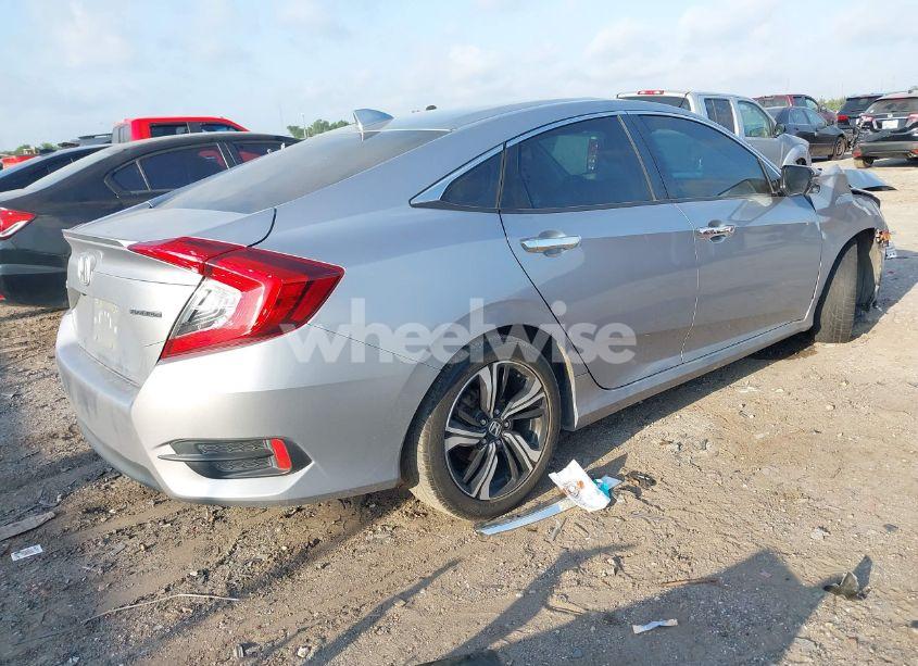 Photo 4 of 2017 Honda Civic TOURING (VIN 2HGFC1F92HH632746)