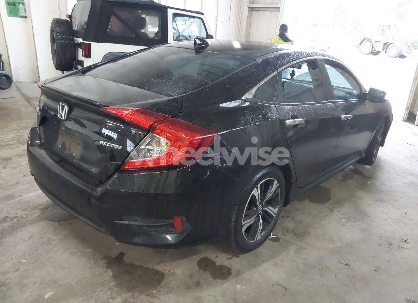 Photo 4 of 2016 Honda Civic TOURING (VIN 2HGFC1F94GH641463)