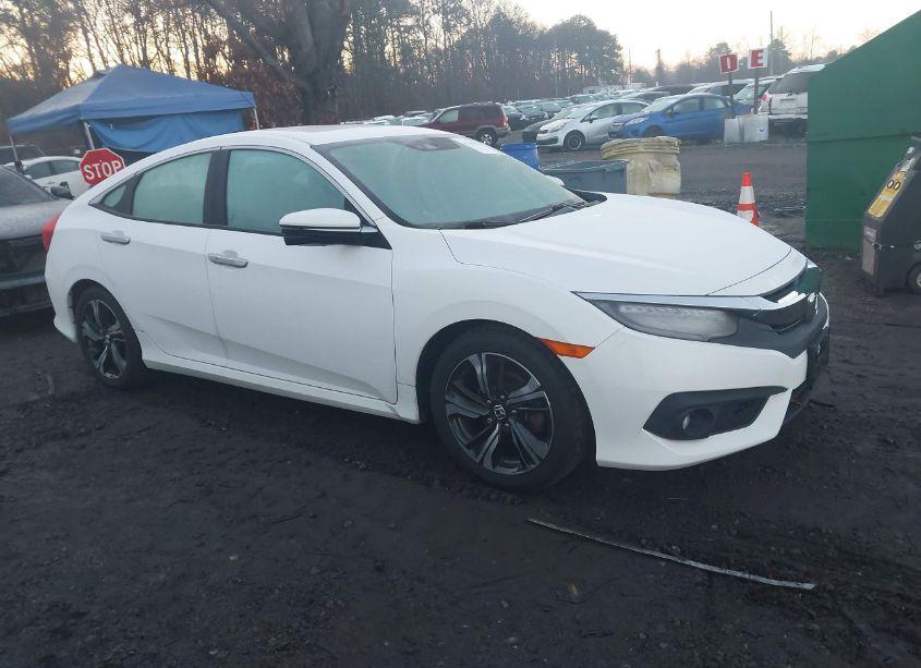 2017 Honda Civic TOURING (VIN 2HGFC1F94HH637124) main photo